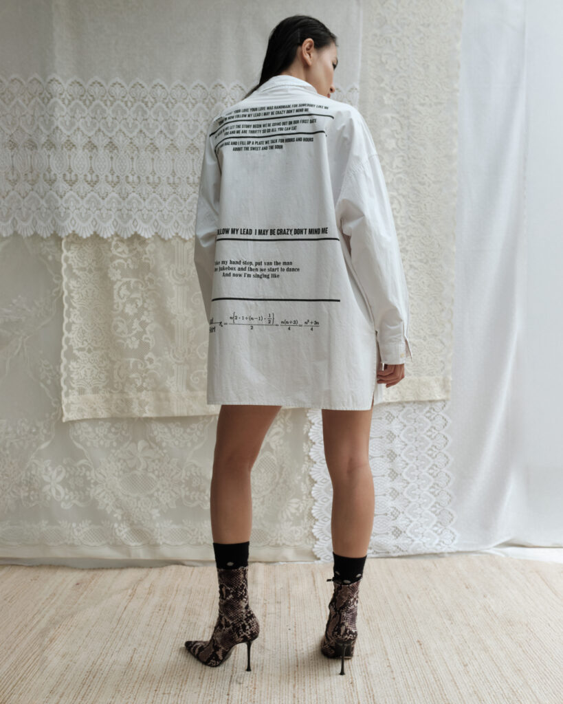 Vintage oversized shirt with mixed prints and asymmetrical design.