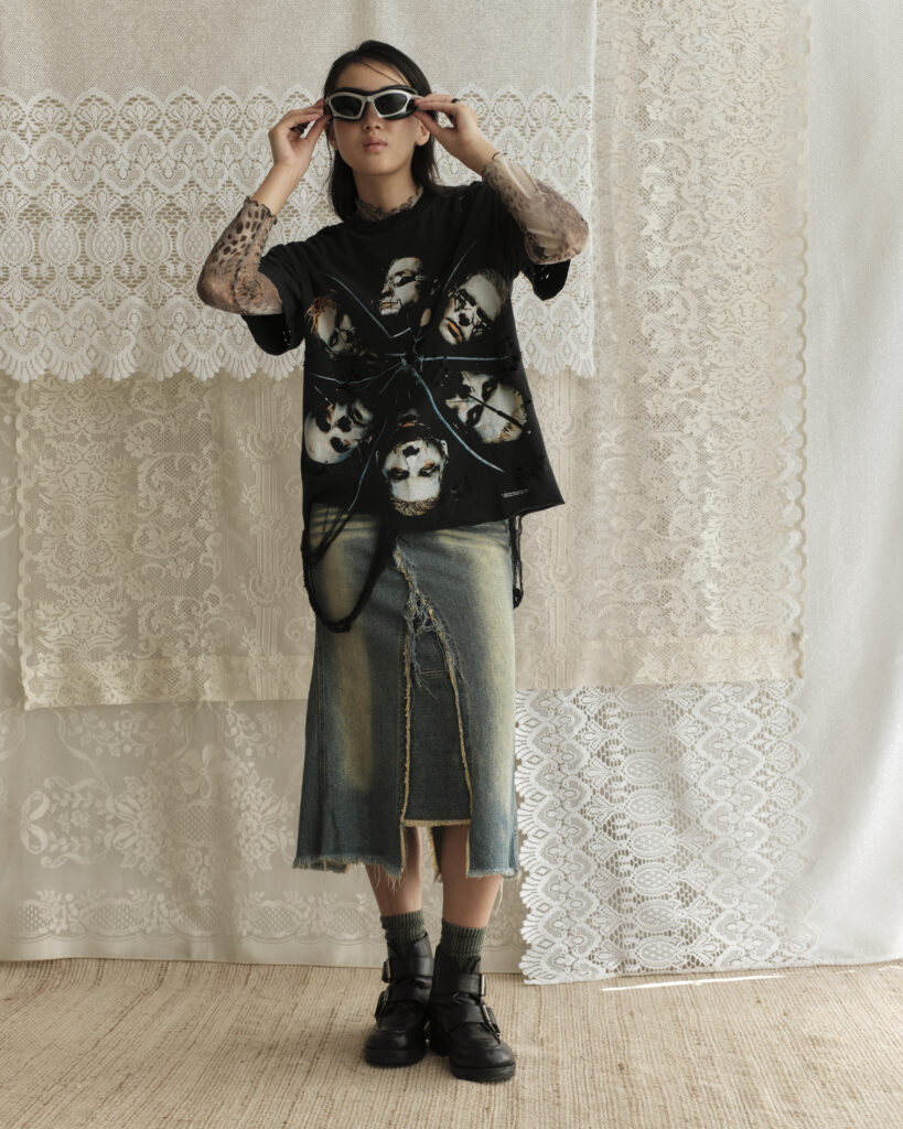 Upcycled Rammstein band tee with distressed details and raw edges.