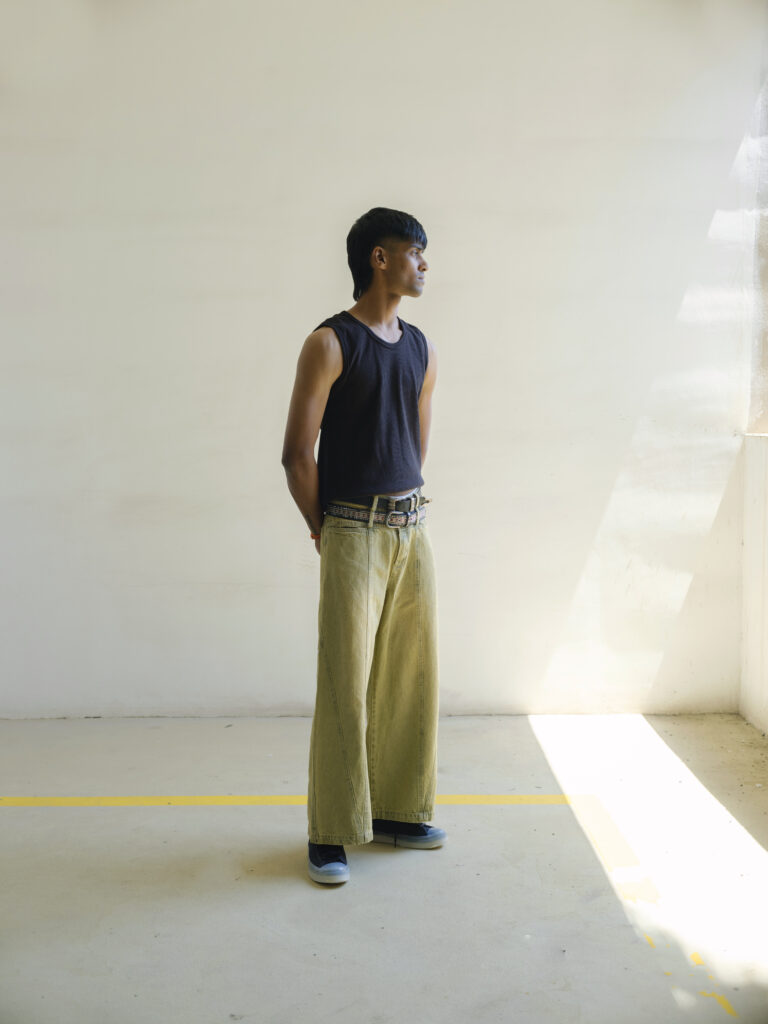 Sand blast washed green denim jeans with relaxed fit and vintage finish.