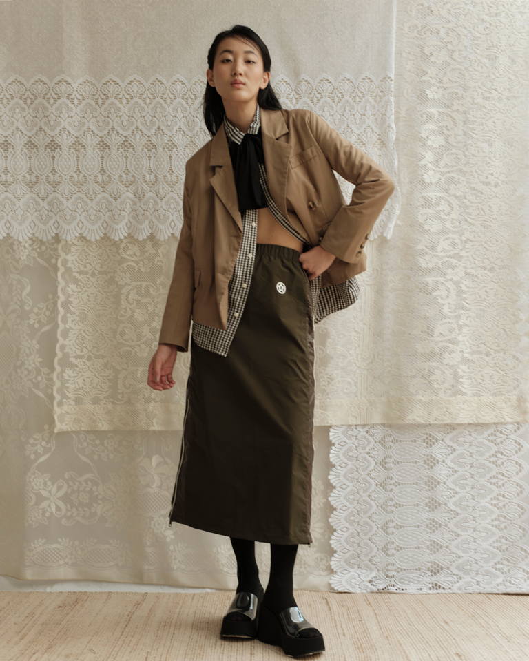 Vintage tan double-breasted blazer with structured fit, front pockets and classic lapel — timeless outerwear curated by Now Thenn.