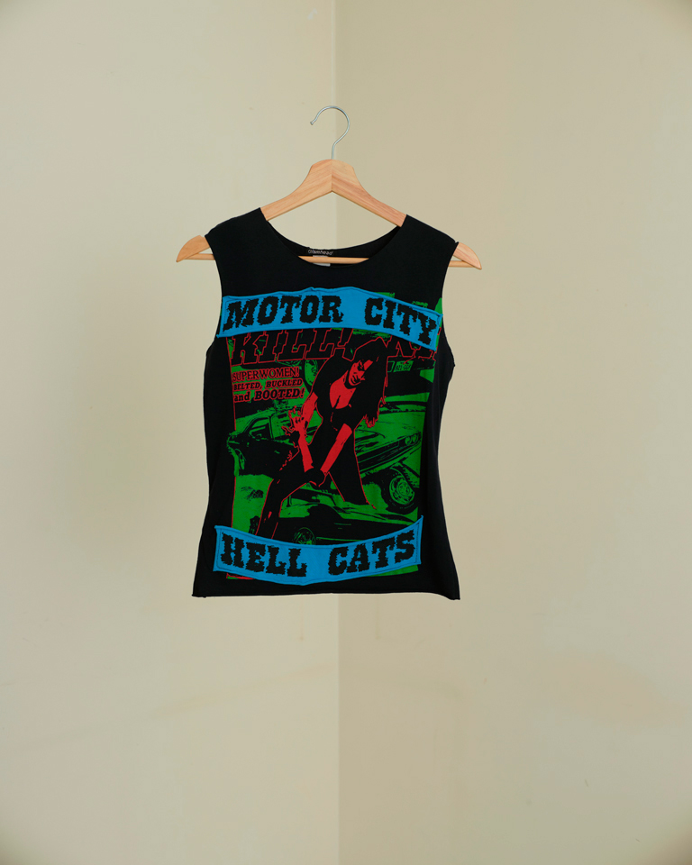 Black sleeveless graphic top with Motor City Hell Cats print and retro artwork, fitted silhouette by Now + Thenn.