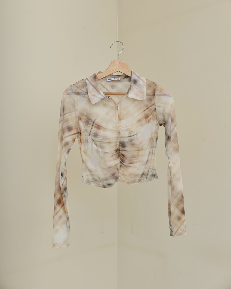 Abstract print ruched mesh crop top with long sleeves and fitted silhouette, sheer stretch fabric by Now + Thenn