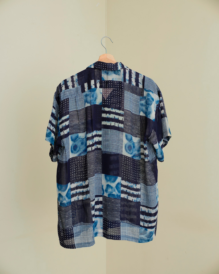 Blue patchwork print short sleeve button-up shirt with abstract pattern and relaxed fit by Now + Thenn.