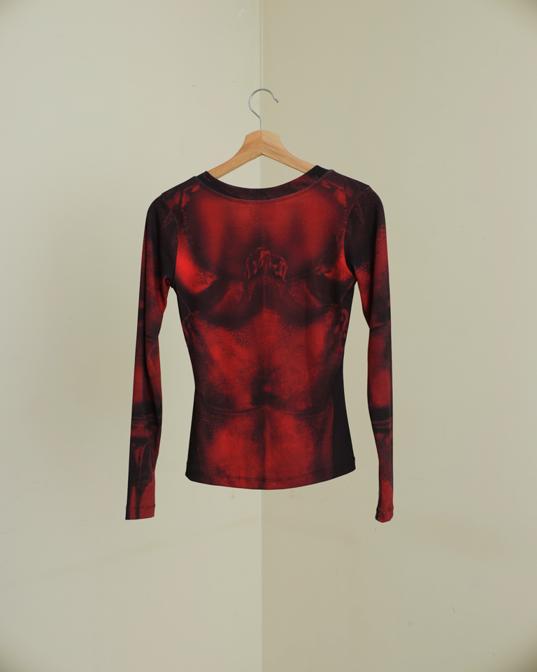 Red long sleeve fitted top with body illusion graphic print, second-skin silhouette by Now + Thenn.