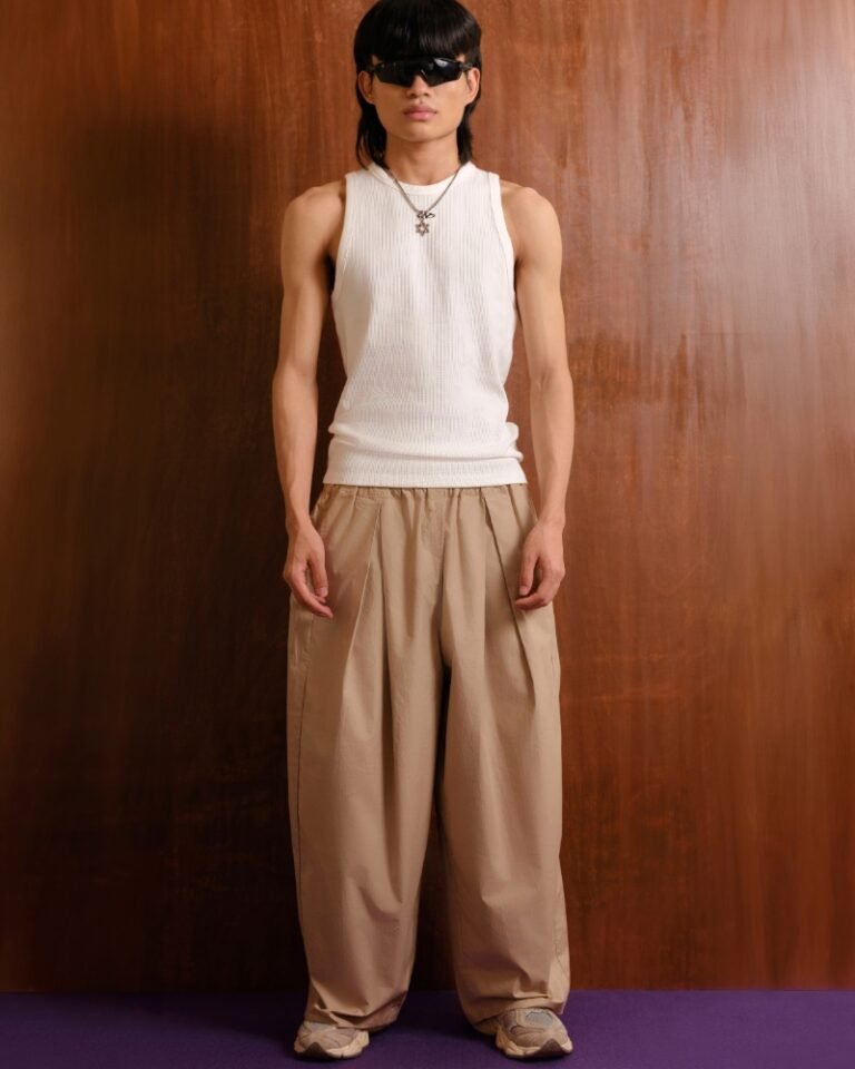 Beige wide-leg trousers with gathered elasticated waistband and front pleats